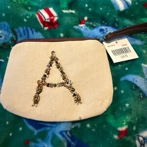 Altar'd State Cream Wristlet with Beaded Initial